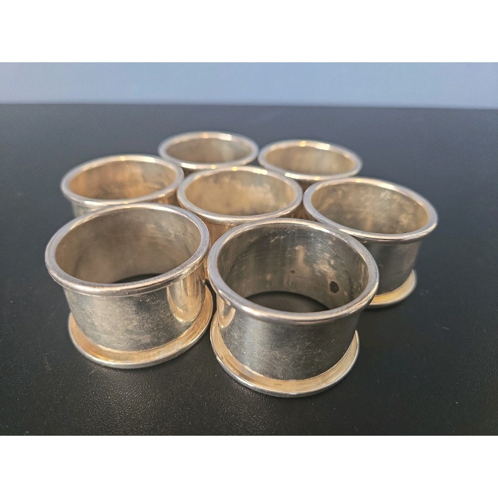 Set of 7  Silverplate Rolled-Edge Napkin Rings Vintage